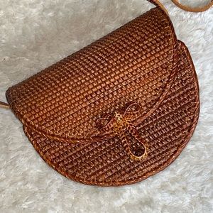 Cute wicker basket style purse with bow detail